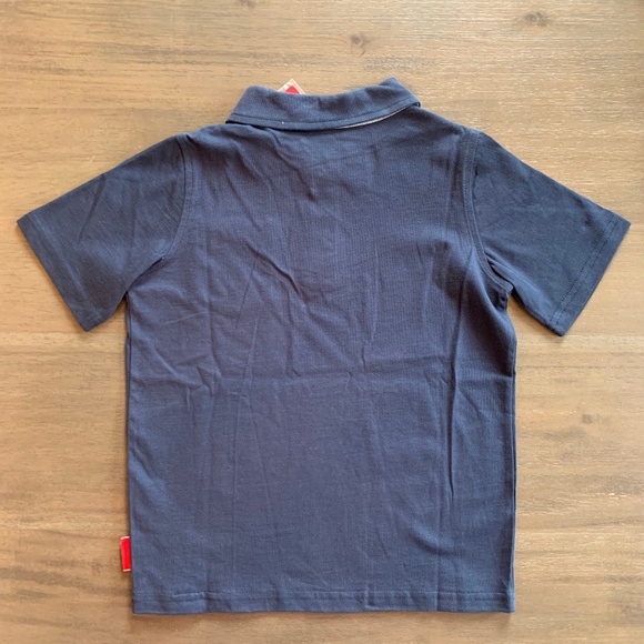New Boys One Kid Navy Short Sleeve Collared Polo Shirt Sizes 5 6 7 - Picture 2 of 2